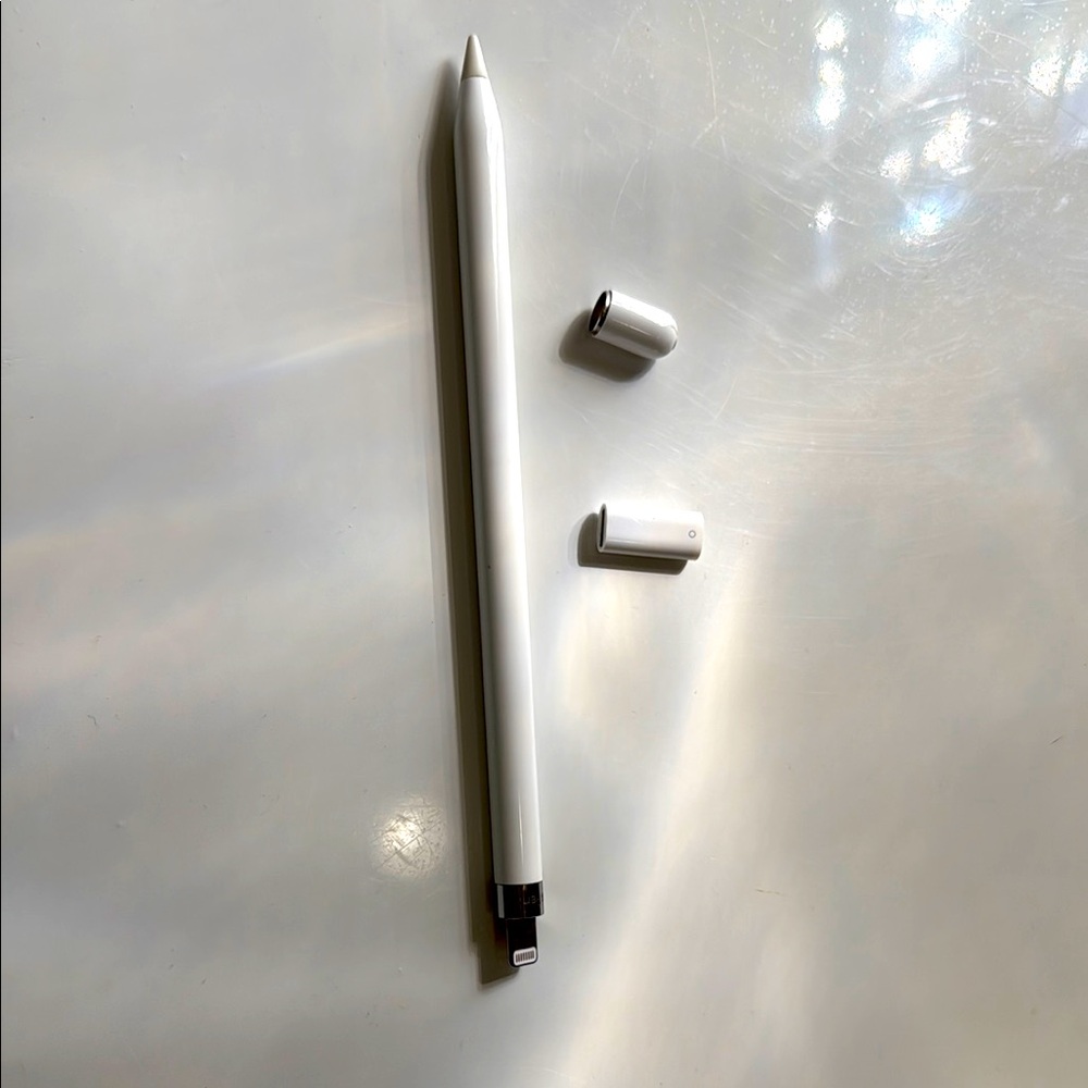 Apple Pencil (first gen) with cap and charger adapter